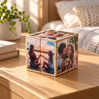 Bling Cube personalized photo cube with family and dog photos on a bedside table